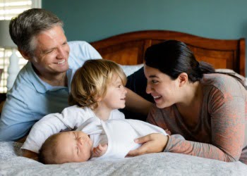 Traveling for the Holidays? Why Knotted Gowns Are Ideal for On-the-Go Newborn Parents!