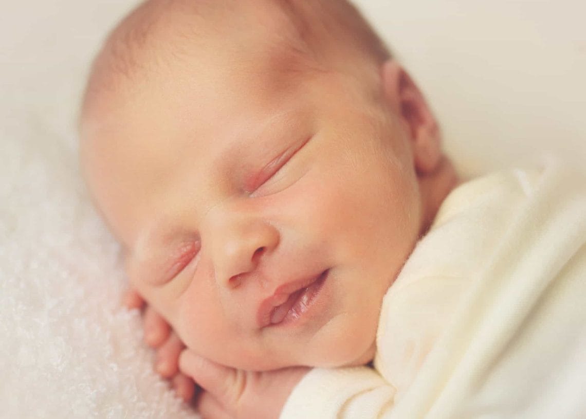 Why Does My Baby Smile in Their Sleep? The Science Behind Newborn Sleep Smiles
