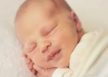 Why Does My Baby Smile in Their Sleep? The Science Behind Newborn Sleep Smiles